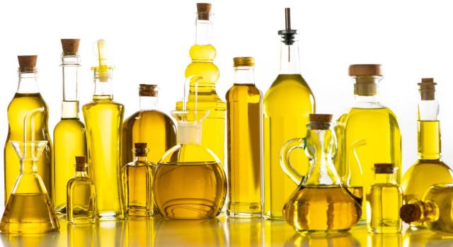 Nuevas medidas en materia fiscal contenidas en el RDL 4/2024 frente a los efectos de las guerras de Ucrania y Oriente Próximo. Imagen de muchas botellas de aceite de oliva